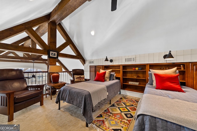 carpeted bedroom with high vaulted ceiling and beamed ceiling