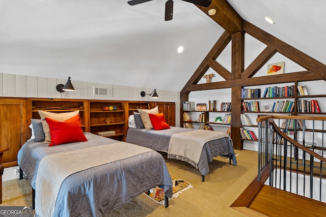 carpeted bedroom featuring lofted ceiling with beams and ceiling fan