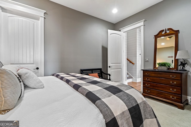 bedroom with light colored carpet