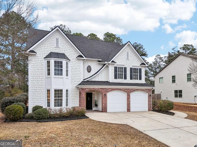 view of front of property with a garage