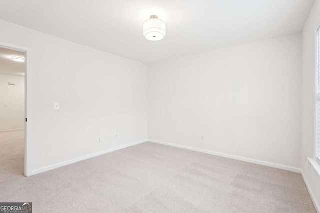 empty room with light carpet