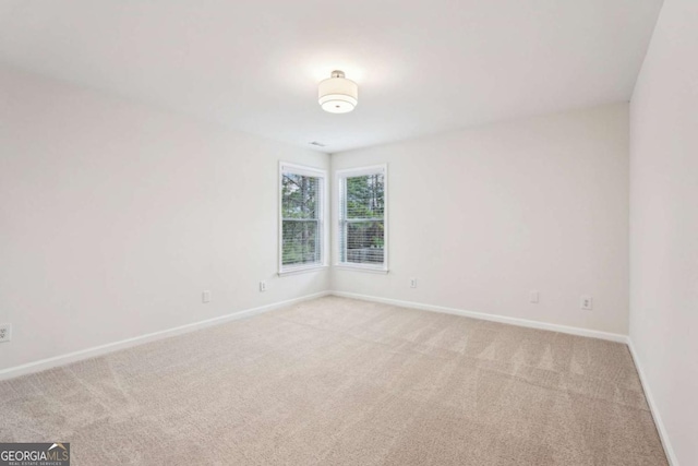 view of carpeted spare room