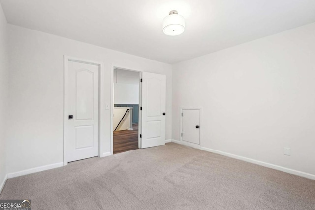 unfurnished bedroom with carpet