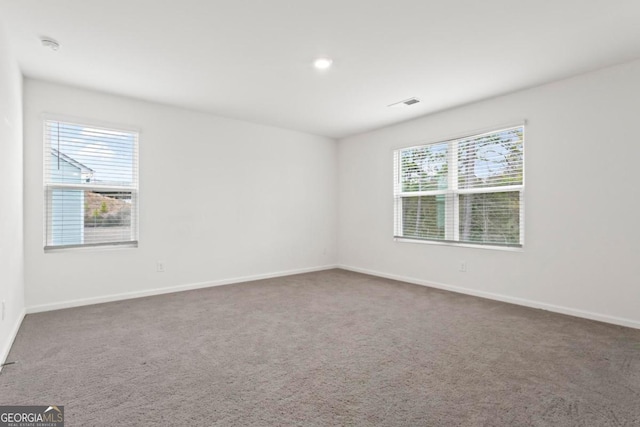 view of carpeted spare room