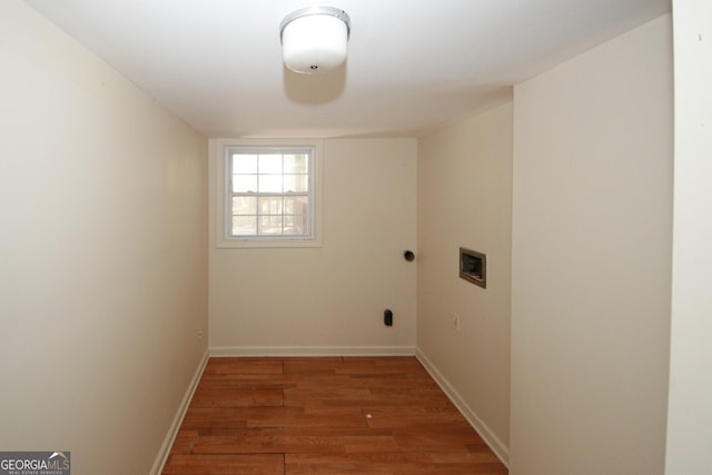 washroom featuring hookup for a washing machine and dark hardwood / wood-style floors