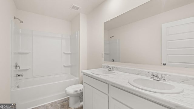 full bathroom featuring vanity, shower / tub combination, and toilet