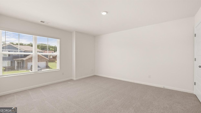 view of carpeted spare room