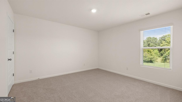 empty room with carpet floors