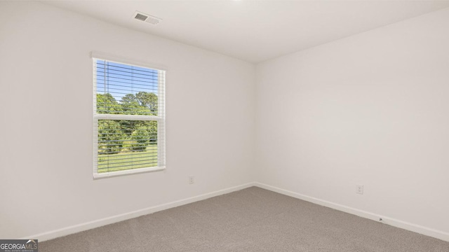 spare room with carpet flooring