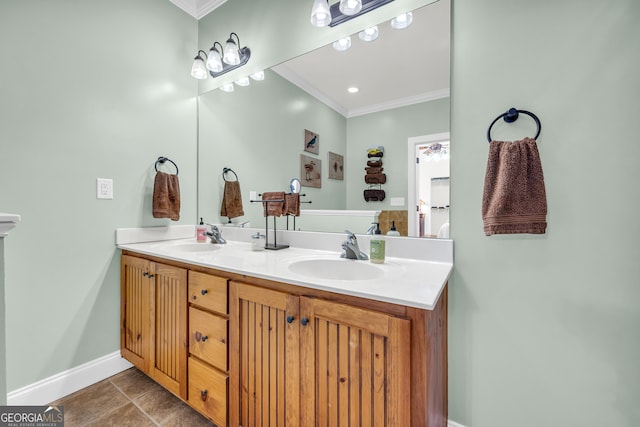 bathroom with vanity, crown molding, and tile patterned floors