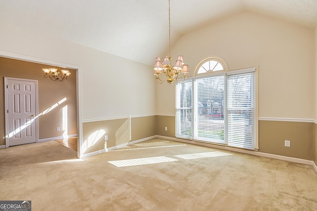 unfurnished room with carpet flooring, high vaulted ceiling, and a notable chandelier