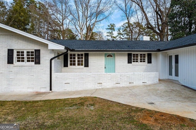 property entrance with a patio area