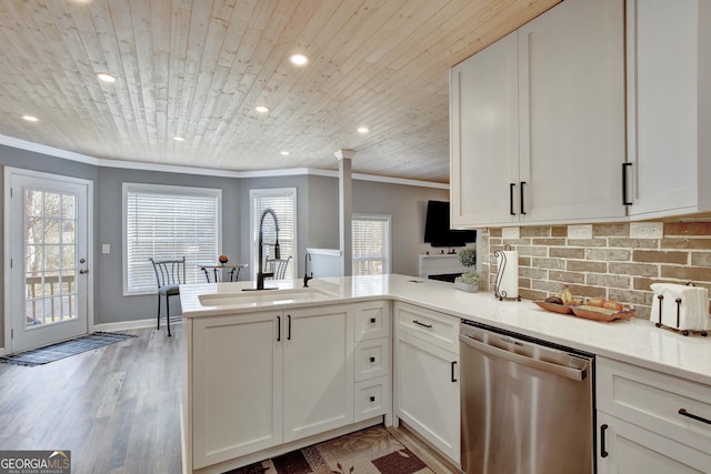 kitchen with sink, white cabinets, stainless steel dishwasher, wooden ceiling, and kitchen peninsula