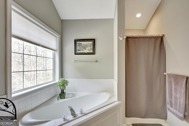 bathroom featuring a tub