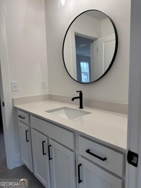 bathroom featuring vanity and tile patterned floors