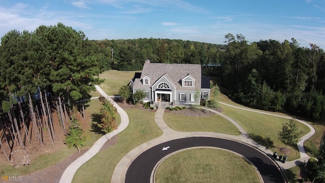 bird's eye view with a forest view