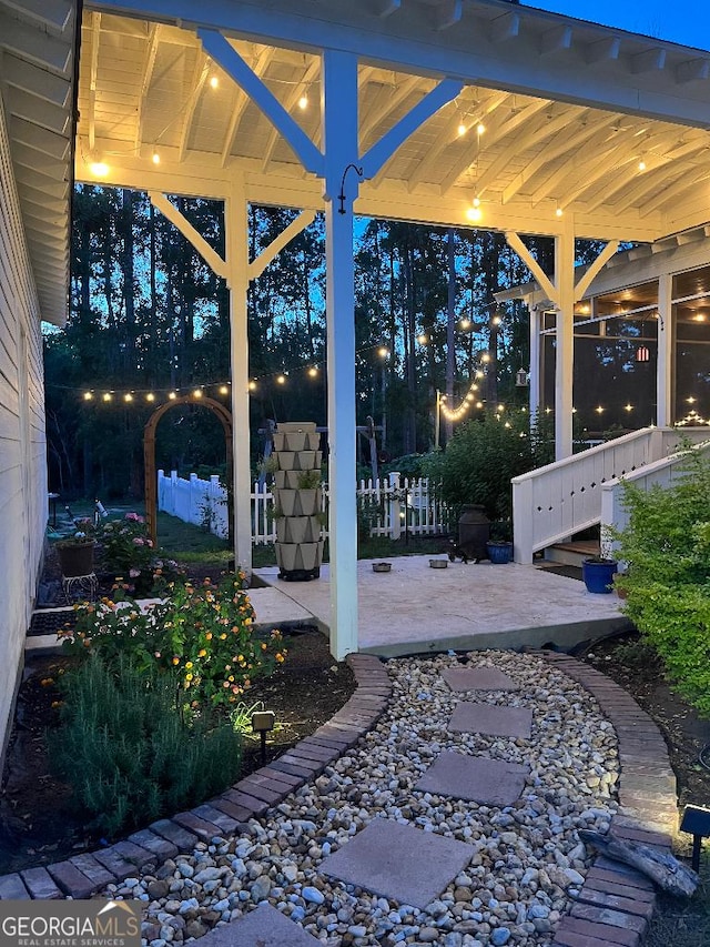 182 Rogers St, Hazlehurst, GA 31539 - patio at twilight with a patio