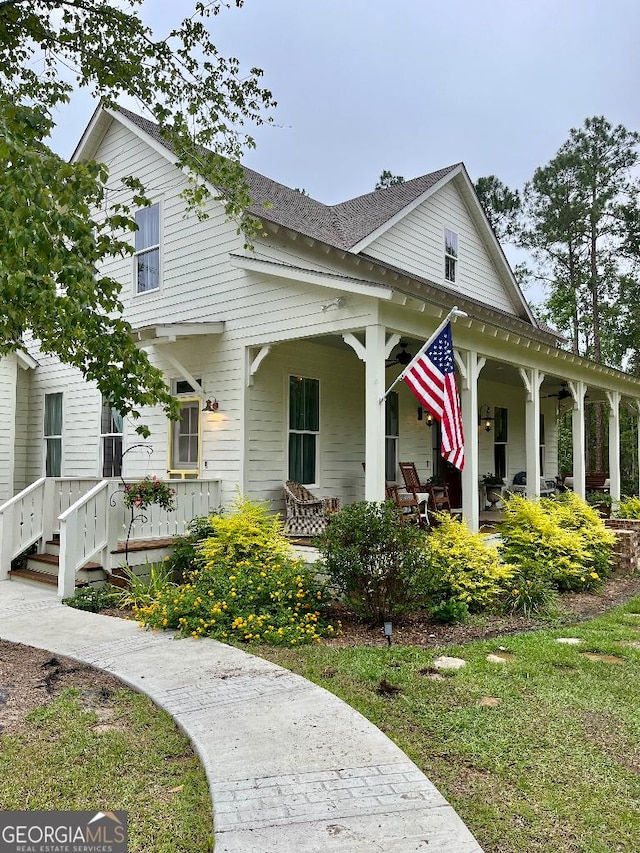 182 Rogers St, Hazlehurst, GA 31539 - view of front of house with roof with shingles and a porch