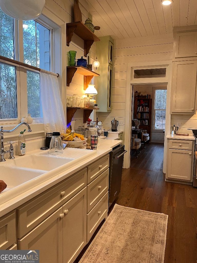 kitchen with dark hardwood / wood-style flooring, wood ceiling, gray cabinets, and dishwasher