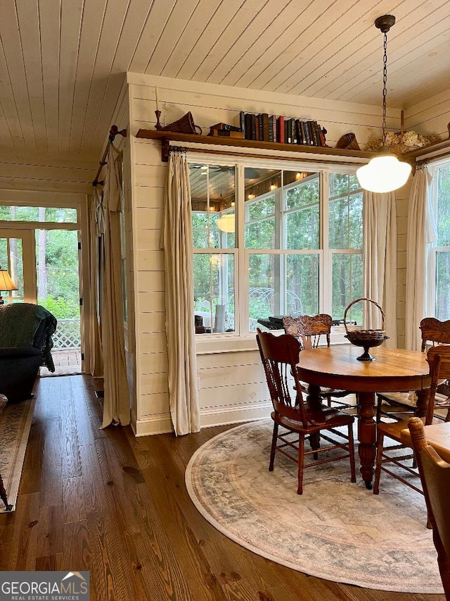 182 Rogers St, Hazlehurst, GA 31539 - dining space featuring wooden ceiling, dark wood-style floors, and wooden walls