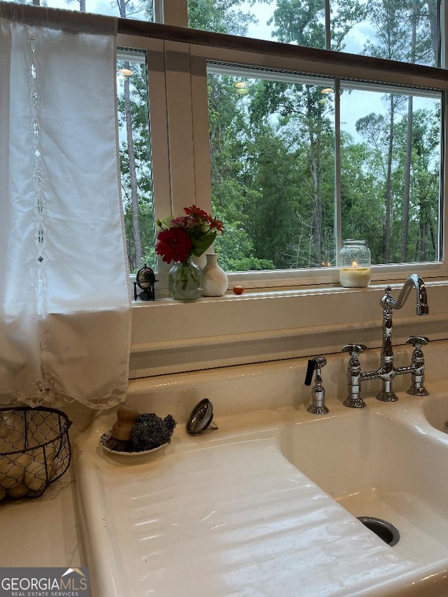 182 Rogers St, Hazlehurst, GA 31539 - kitchen view of a sink and light countertops