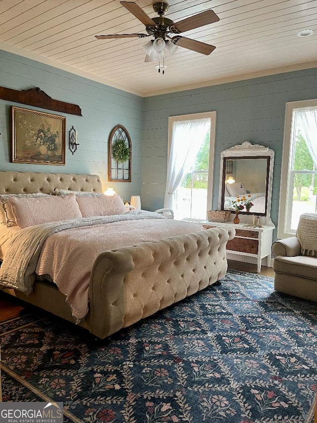182 Rogers St, Hazlehurst, GA 31539 - bedroom featuring access to exterior, ceiling fan, wood finished floors, and wood ceiling