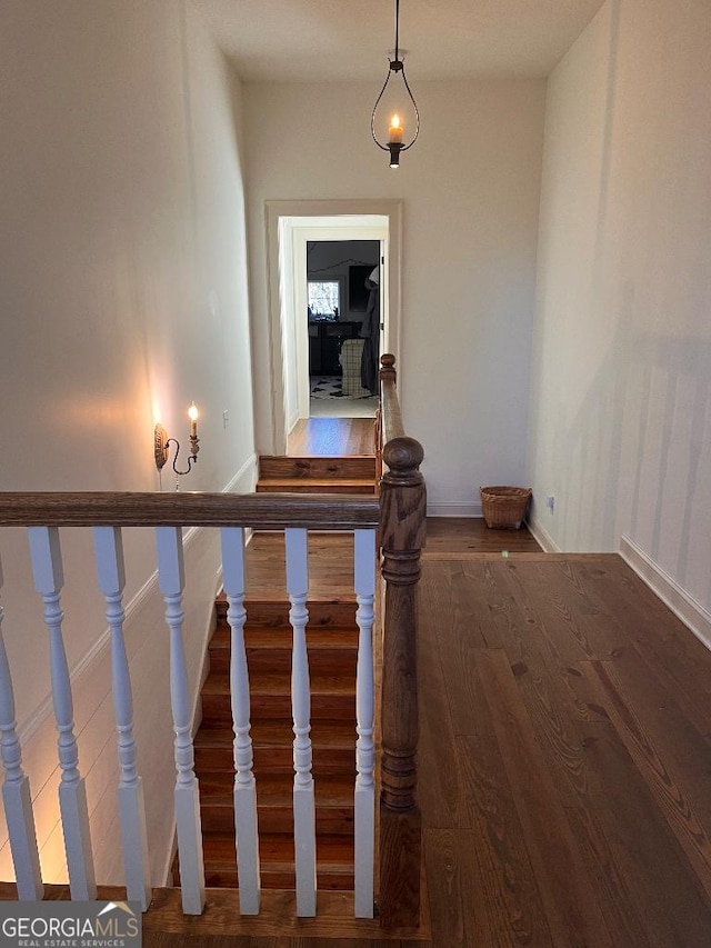 182 Rogers St, Hazlehurst, GA 31539 - stairway with wood finished floors and baseboards