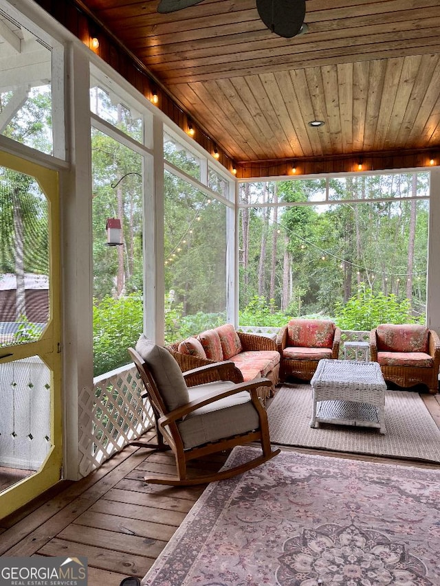 182 Rogers St, Hazlehurst, GA 31539 - sunroom featuring outdoor lounge area, healthy amount of natural light, and ceiling fan