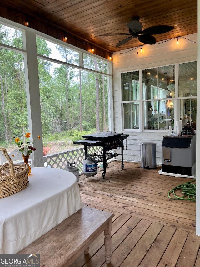 182 Rogers St, Hazlehurst, GA 31539 - sunroom with a ceiling fan and outdoor dining area