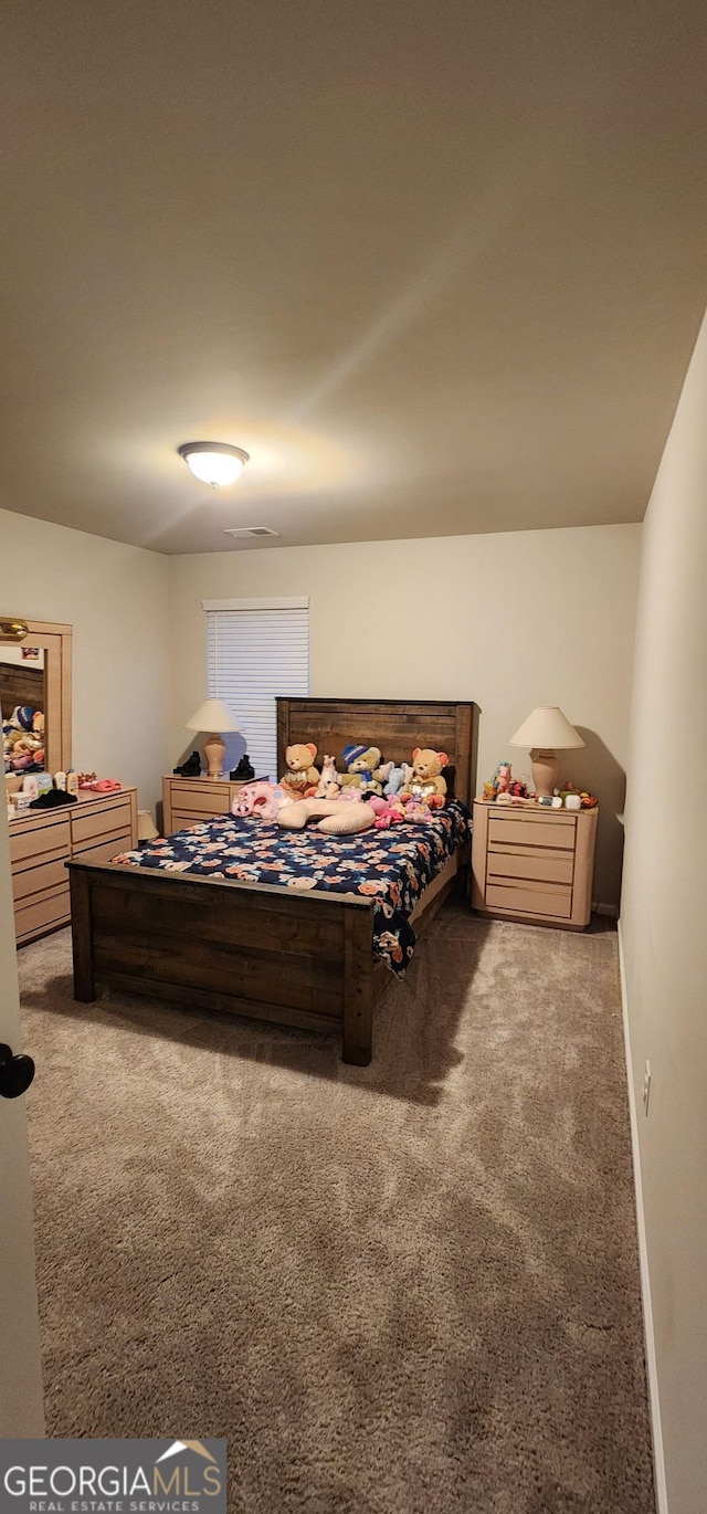 bedroom featuring carpet