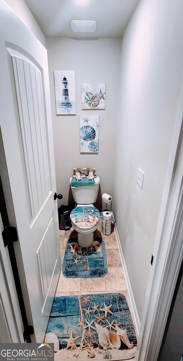 bathroom featuring toilet