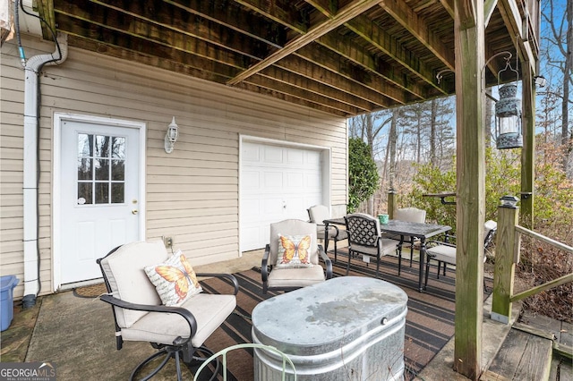 view of patio with a garage