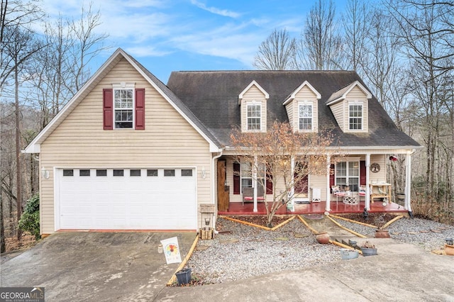 cape cod-style house with a porch and a garage