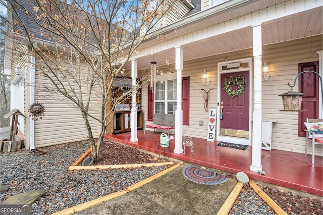 property entrance featuring covered porch