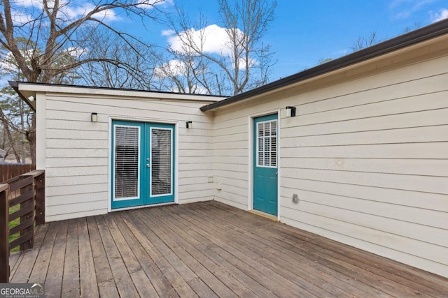 wooden terrace featuring french doors