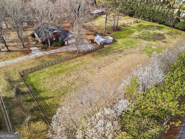 birds eye view of property featuring a rural view