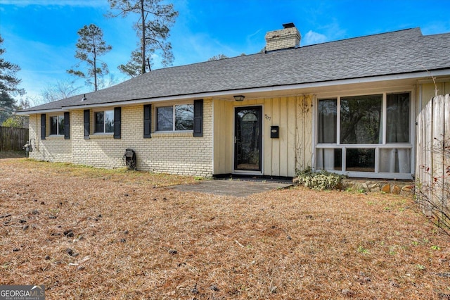 ranch-style house with a front yard