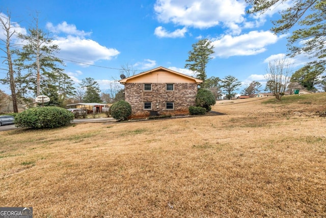 exterior space with a yard