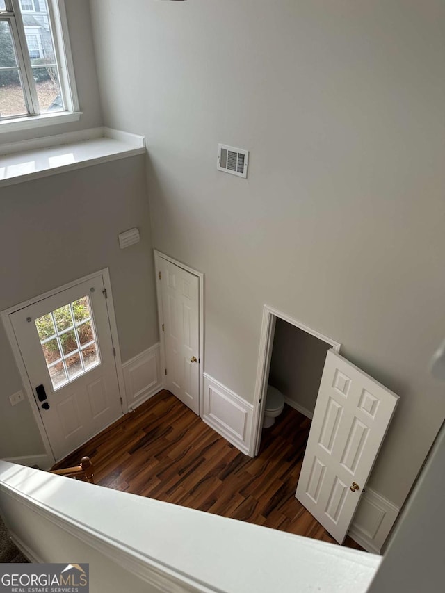 entrance foyer with dark hardwood / wood-style flooring