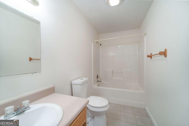 full bathroom with tile patterned flooring, bathing tub / shower combination, vanity, and toilet