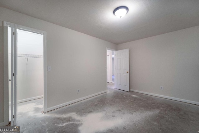 empty room featuring concrete floors