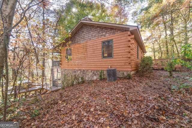 view of home's exterior featuring a deck