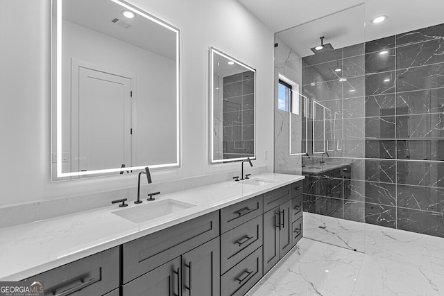 bathroom featuring vanity and a tile shower