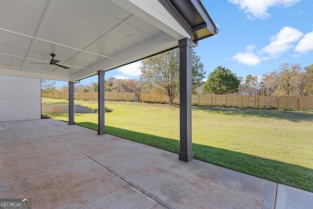 view of patio featuring ceiling fan