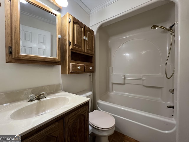 full bathroom featuring vanity, ornamental molding, toilet, and washtub / shower combination