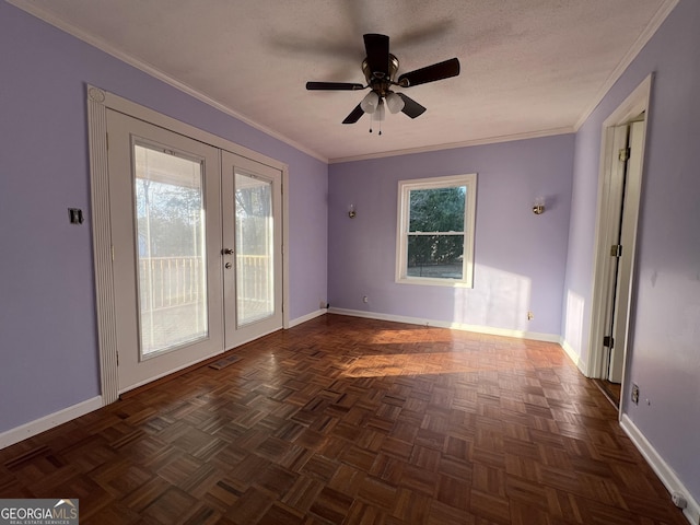 unfurnished room with ornamental molding, a wealth of natural light, and french doors