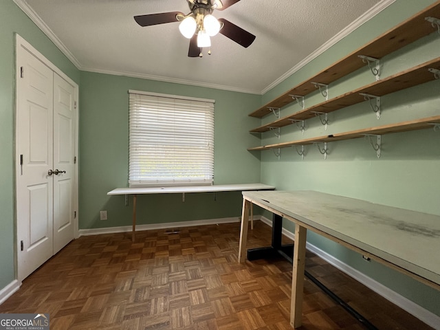 unfurnished office featuring crown molding, ceiling fan, dark parquet floors, and a textured ceiling