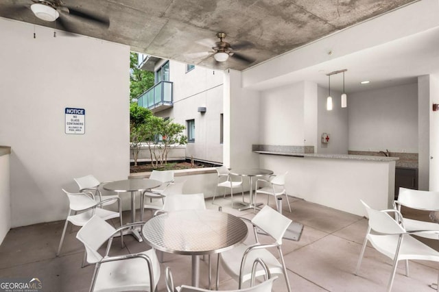 dining space featuring ceiling fan