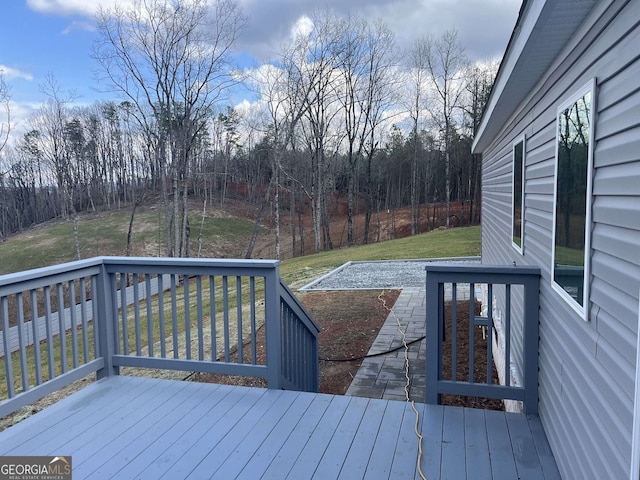 deck featuring a lawn