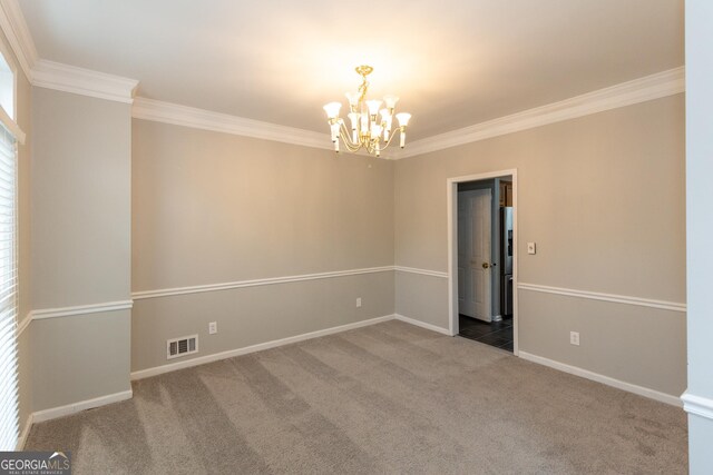 unfurnished room featuring crown molding, a chandelier, and dark colored carpet